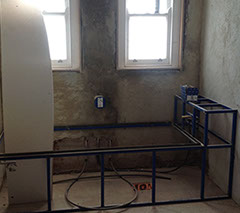 Walls are rendered and bath is framed