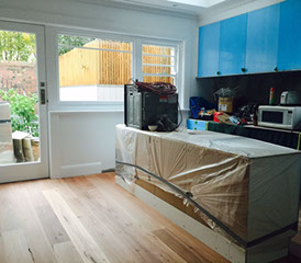 A progress photo of the new kitchen and new floor