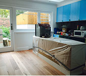 A progress photo of the new kitchen and new floor