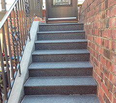 Concrete stairs with granite pavers
