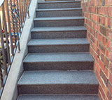 Concrete stairs with granite pavers