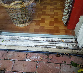 A rotten window sill prior to repair