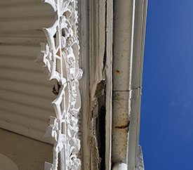 Rotten fasia and rusty gutters
