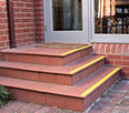 Stairs with tiles before removal
