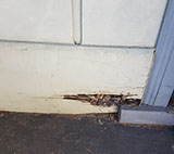 Rotten timber on a front porch