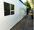Repainted weatherboard wall